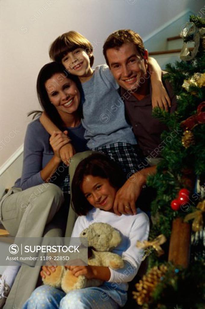 Stock Photo: 1189-2285D Mid adult couple with their son and daughter
