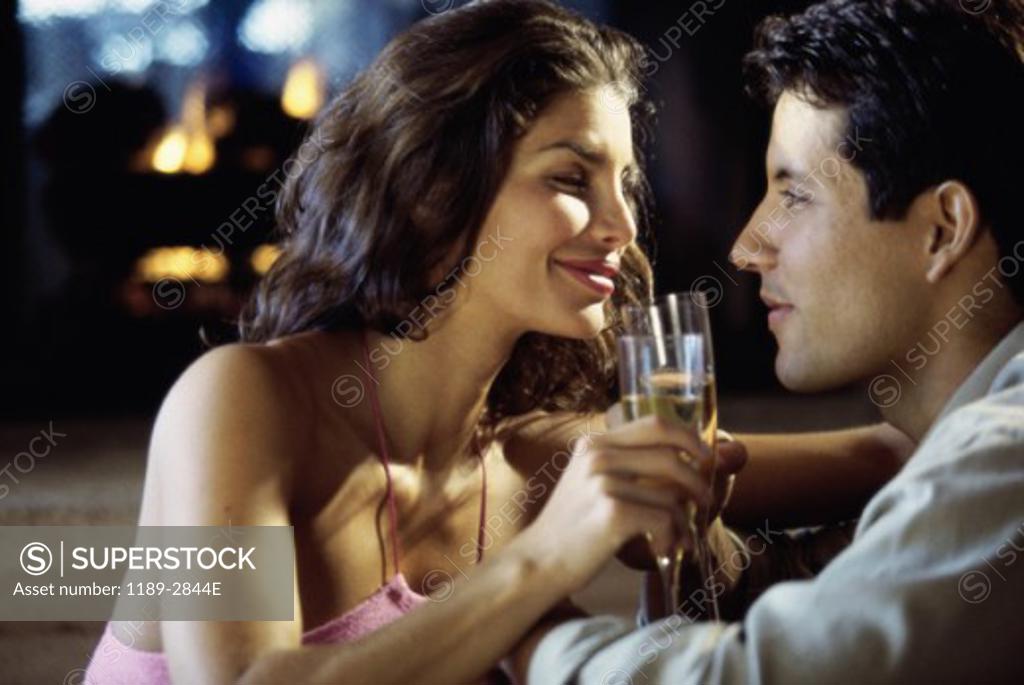Stock Photo: 1189-2844E Young couple drinking champagne