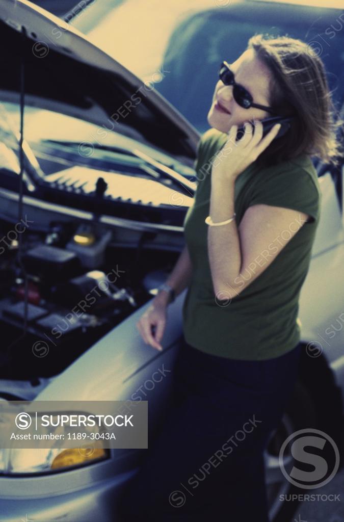 Stock Photo: 1189-3043A Young woman talking on a mobile phone