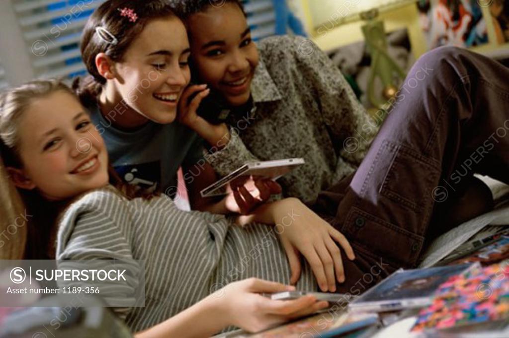Stock Photo: 1189-356 Three teenage girls together