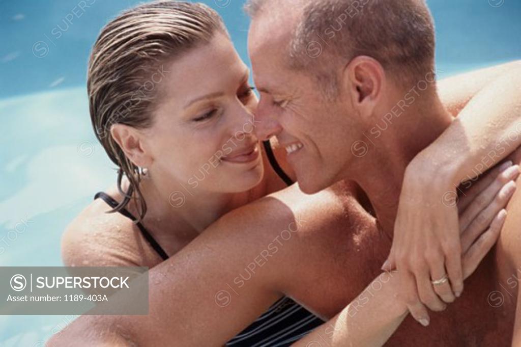 Stock Photo: 1189-403A Portrait of a mid adult couple holding each other