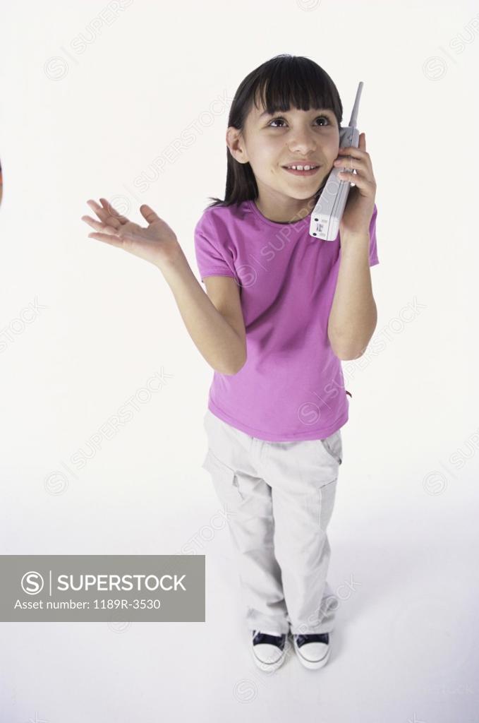 Stock Photo: 1189R-3530 Girl talking on a telephone
