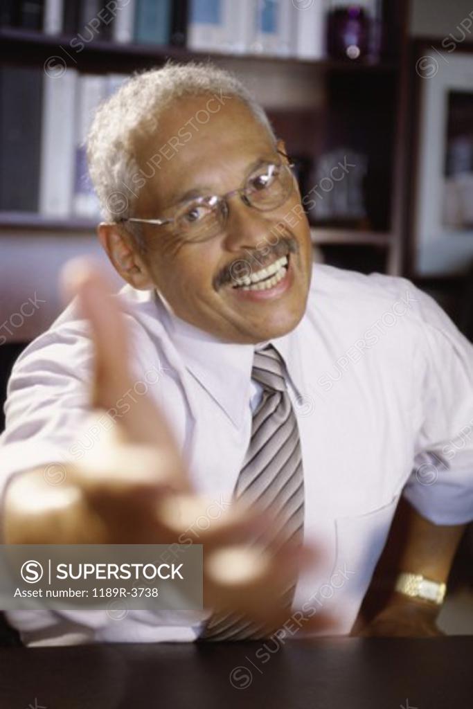 Stock Photo: 1189R-3738 Close-up of a businessman holding his hand out