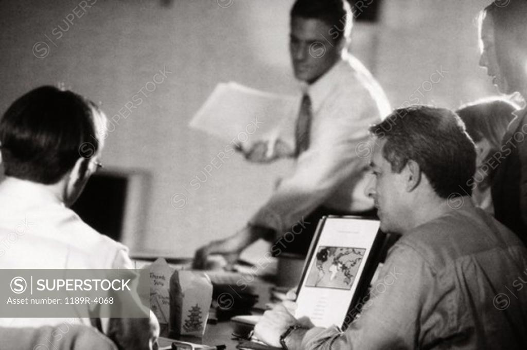 Stock Photo: 1189R-4068 Business executives in a meeting