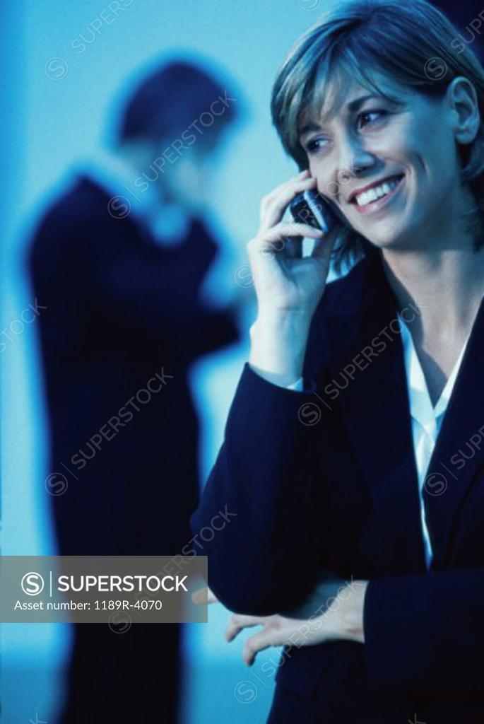 Stock Photo: 1189R-4070 Businesswoman talking on a mobile phone