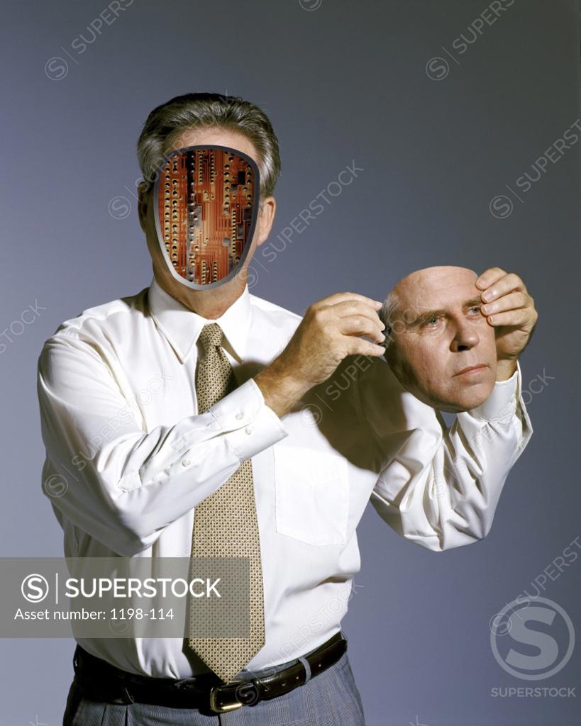 Stock Photo: 1198-114 Businessman holding his face
