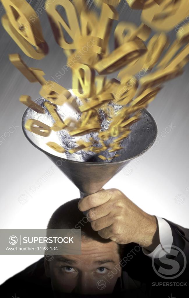 Stock Photo: 1198-134 High angle view of a mid adult man holding a funnel with binary code