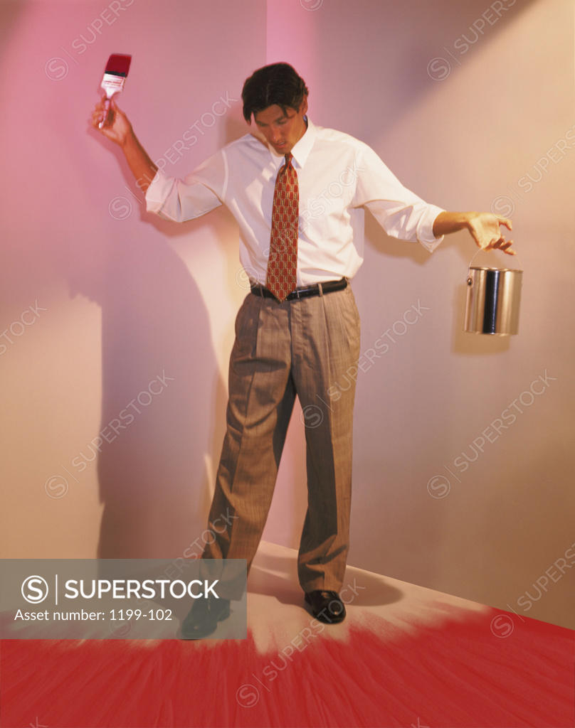 Stock Photo: 1199-102 Businessman painted himself into a corner