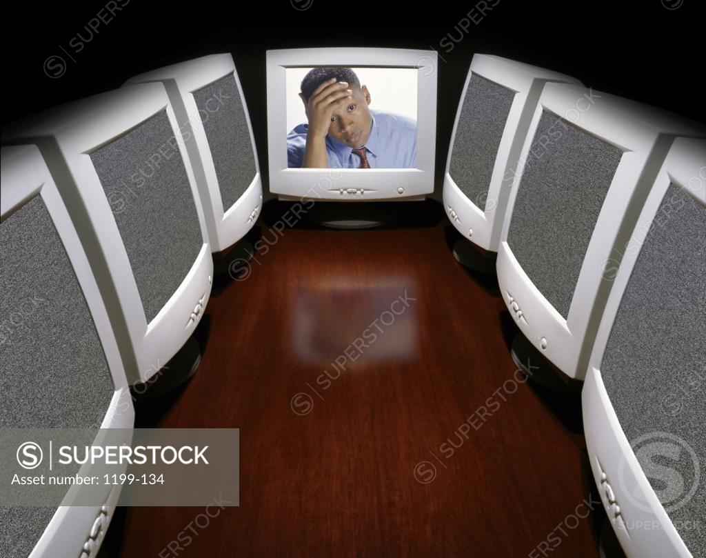 Stock Photo: 1199-134 Computer monitors in a row