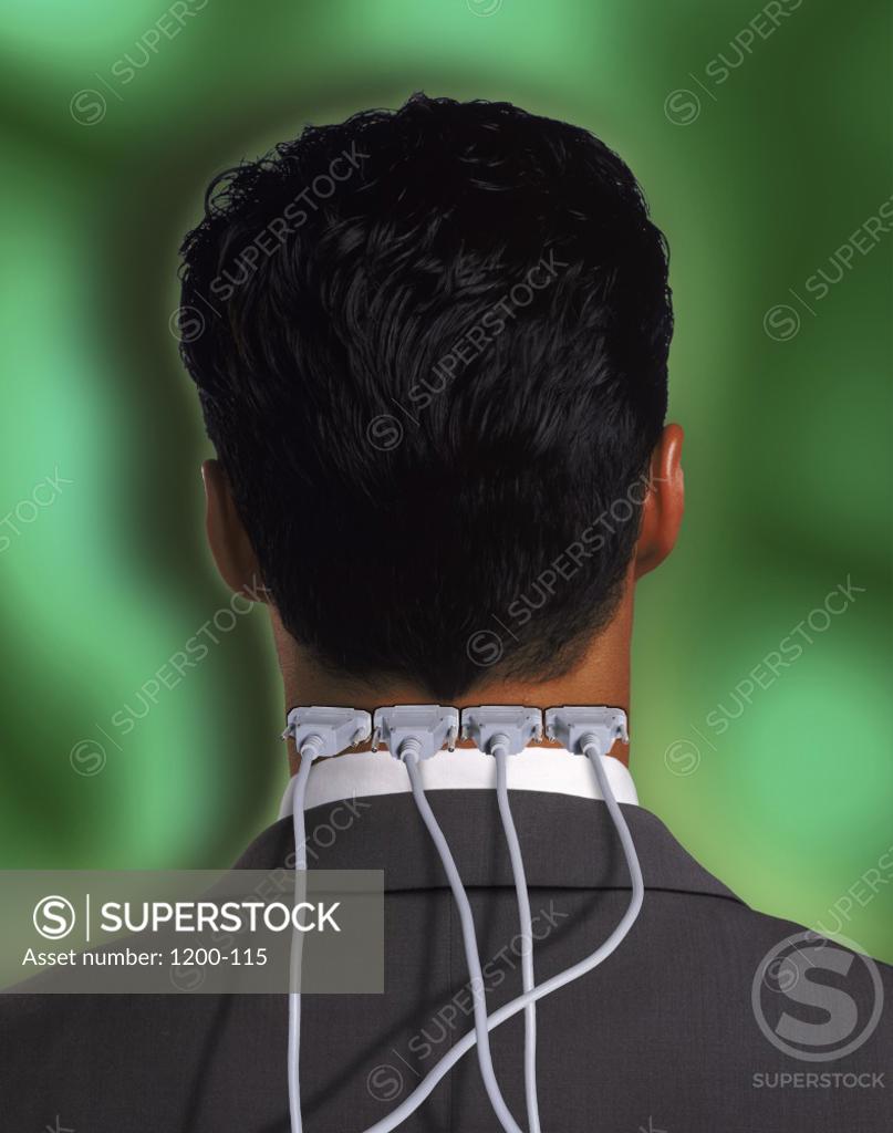Stock Photo: 1200-115 Rear view of a businessman with computer cables in his neck