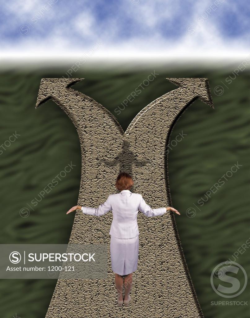 Stock Photo: 1200-121 Rear view of a businesswoman on a path