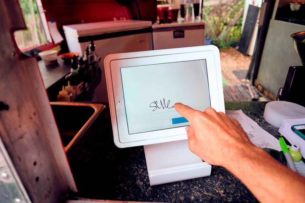 Digital screen for food orders and payment at eatery