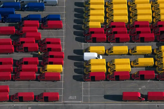 UK, Essex, Purfleet Docks, Aerial view of rows of colorful vans