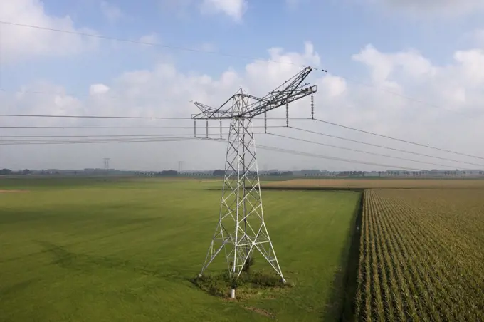 Power lines running through fields