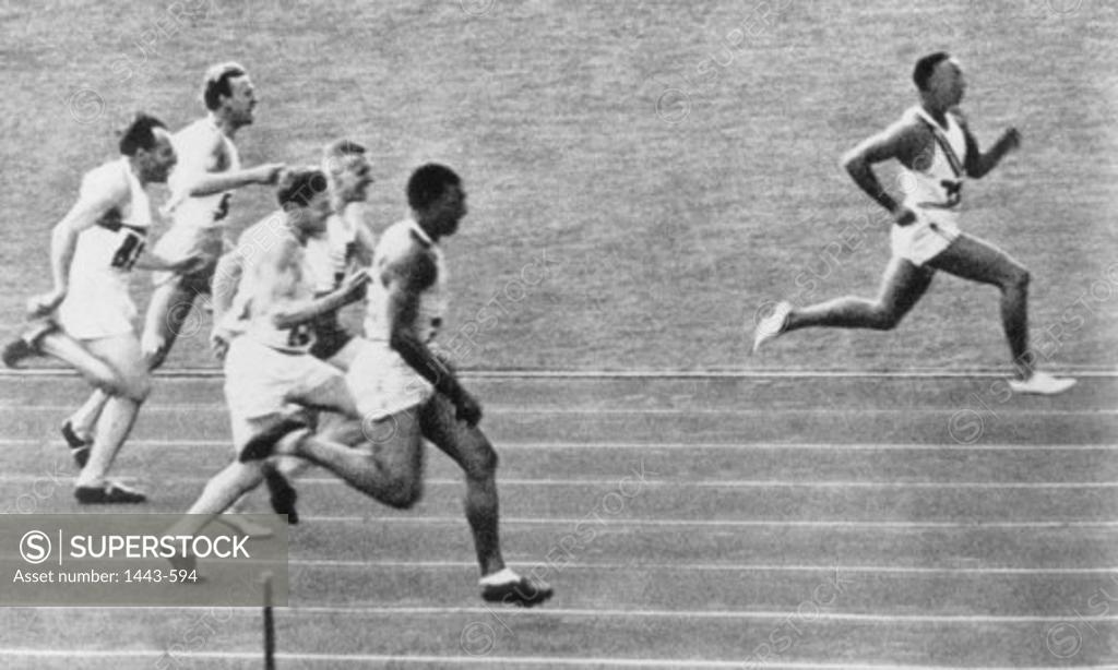 Stock Photo: 1443-594 Jesse Owens Winning 100 meter race, 1936 Olympic Games, Berlin, Germany, August 3, 1936