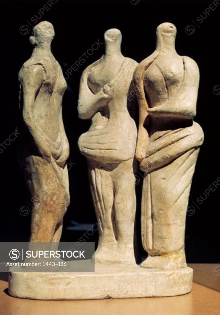 Stock Photo: 1443-886 Three Standing Figures (Model for Sculpture in London's Battersea Park)  1945  Henry Moore (1898-1986 British) Plaster The Henry Moore Foundation, Much Hadham, Hertfordshire, UK