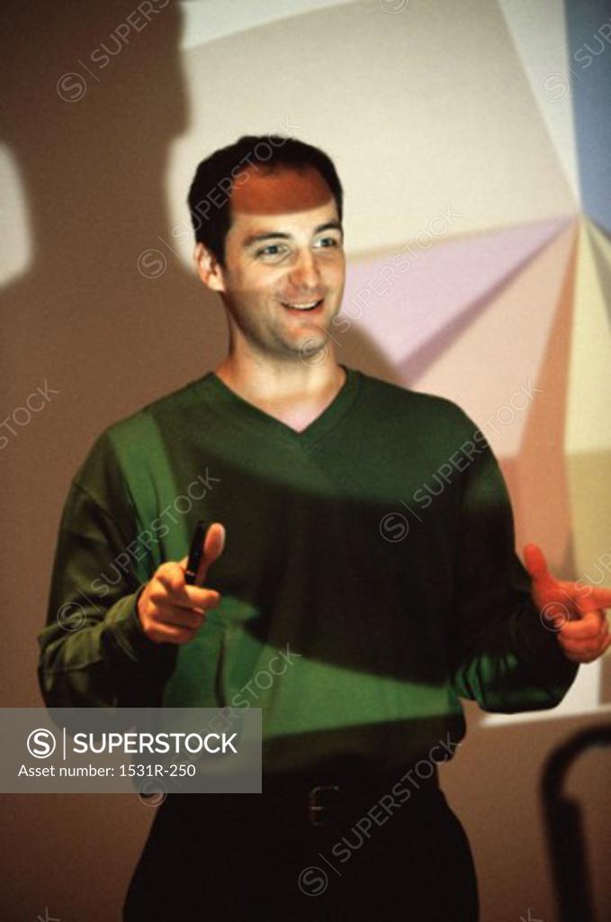 Stock Photo: 1531R-250 Businessman giving a presentation in an office