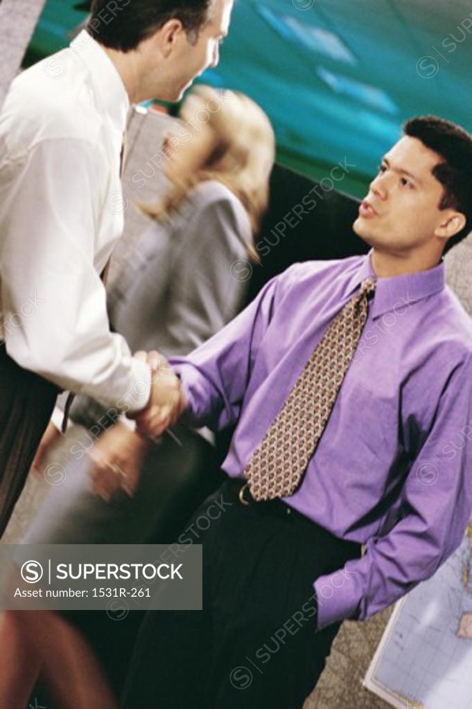 Stock Photo: 1531R-261 Two businessmen shaking hands