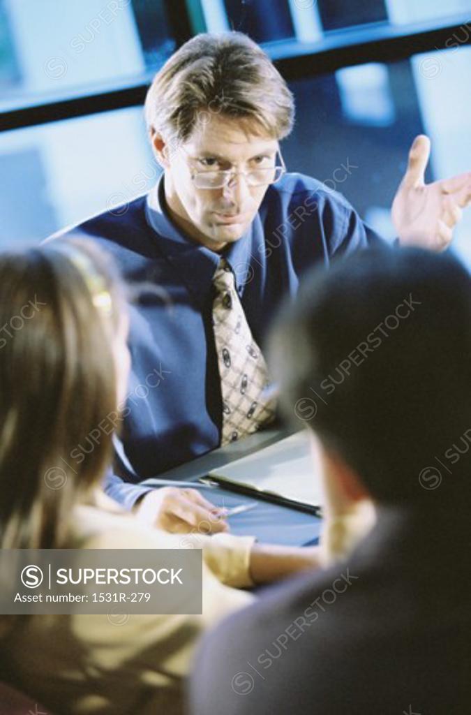 Stock Photo: 1531R-279 Business executives in a meeting