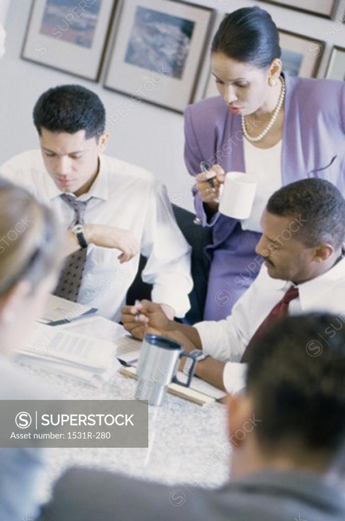 Stock Photo: 1531R-280 Business executives in a meeting