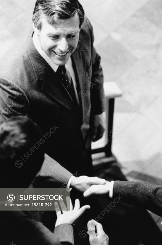 Stock Photo: 1531R-292 High angle view of a businessman shaking hands