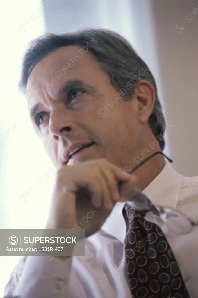 Low angle view of a businessman talking