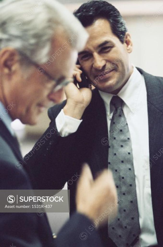 Stock Photo: 1531R-437 Two businessmen in an office