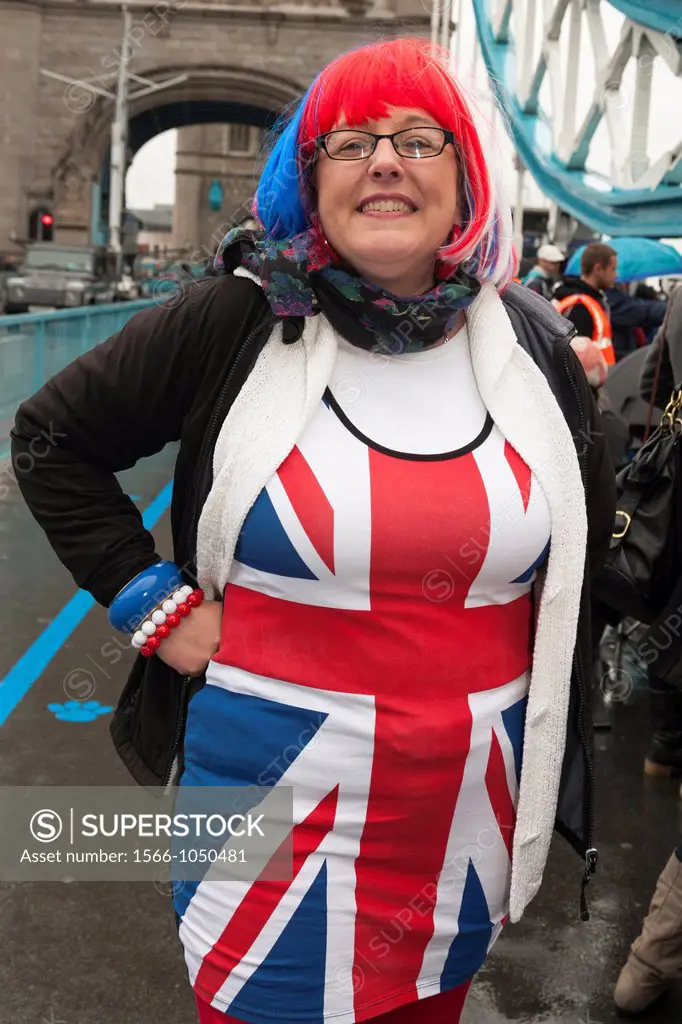 Debbie Howard from Essex, England wearing patriotic Union Jack dress, on Tower Bridge, during Queen’s Thames Diamond Jubilee Pageant, London, UK, 3rd ...
