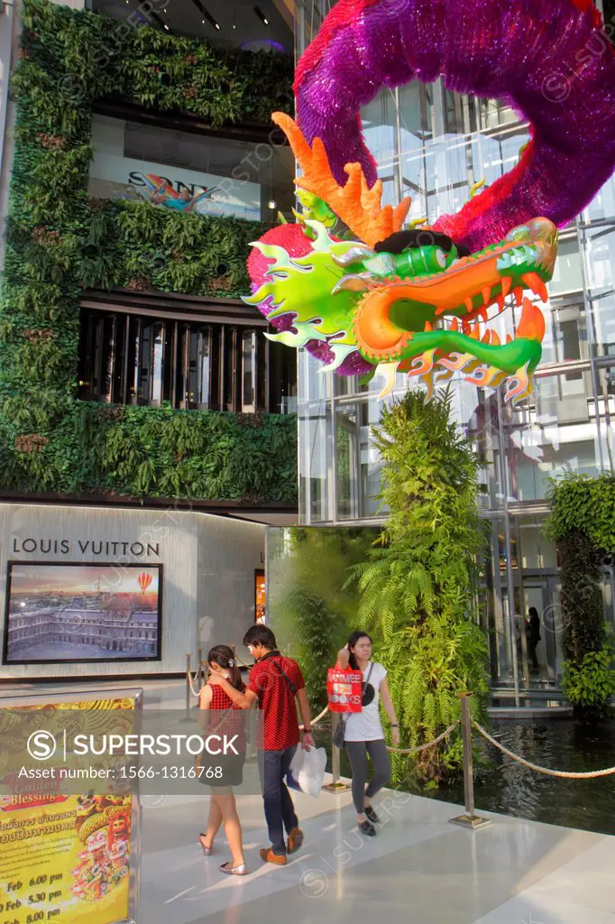 Thailand, Bangkok, Pathum Wan, Rama 1 Road, Siam Paragon, complex, mall,  shopping, Louis Vuitton, Chinese New Year, dragon, decoration. - SuperStock