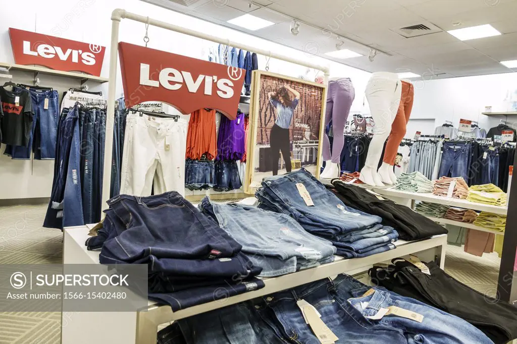 Florida, Miami, Kendall, Dadeland Mall, shopping, Macy's Department Store,  inside, display sale, Levi's denim jeans, women's, - SuperStock