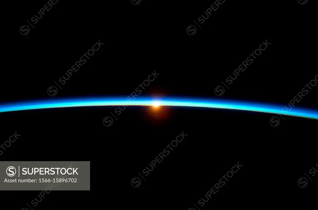 Thin Blue Line The thin line of Earth´s atmosphere and the setting sun are featured in this image photographed by the crew of the International Space ...