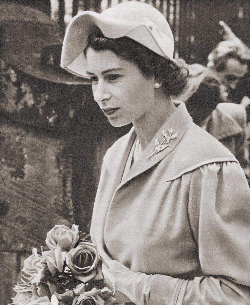 EDITORIAL ONLY Queen Elizabeth II seen here in 1952. Elizabeth II, Queen of the United Kingdom, born 1926. From The Queen Elizabeth Coronation Book, p...