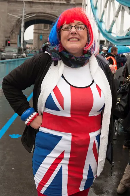 Debbie Howard from Essex, England wearing patriotic Union Jack dress, on Tower Bridge, during Queen’s Thames Diamond Jubilee Pageant, London, UK, 3rd ...