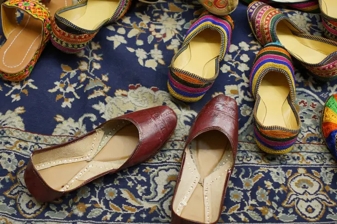 Traditional footwear made by local artisans for sale at Jodhpur in Rajasthan, India.