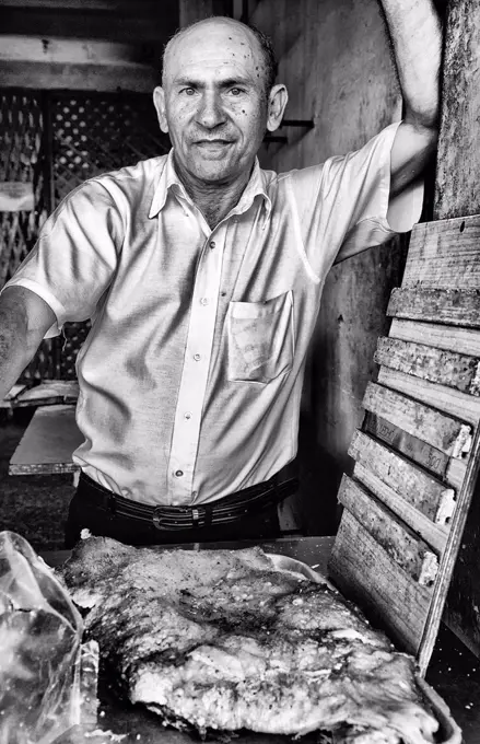 Portrait of local man with food for sale in Havana Cuba