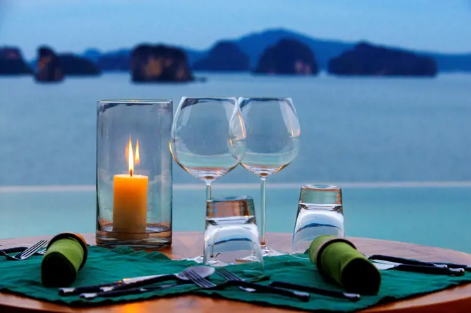 Six Senses Resort, Koh Yao Noi, Phang Nga Bay, Thailand, Asia. Romantic table in the restaurant near the swimming pool called The Hilltop Reserve in f...