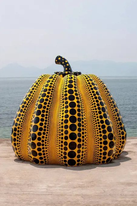 A pumpkin sculpture by the avant-garde octogenarian Japanese artist, Yayoi Kusama, in Naoshima, Japan