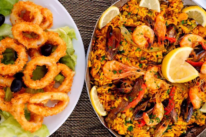 Food: deep fried squids and Spanish ´paella´