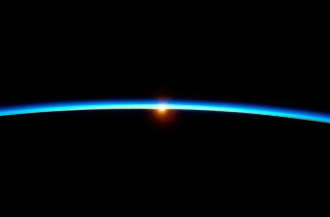 Thin Blue Line The thin line of Earth´s atmosphere and the setting sun are featured in this image photographed by the crew of the International Space ...
