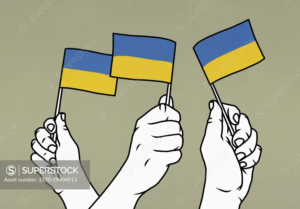 Hands waving Flags of Ukraine