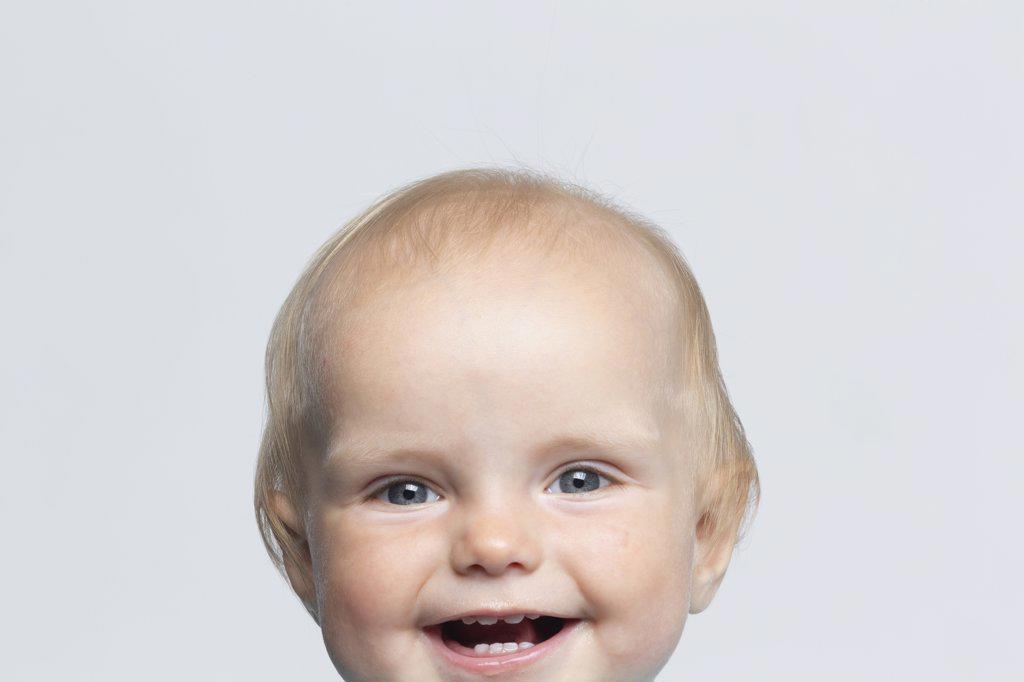 Portrait cute happy baby boy on white background