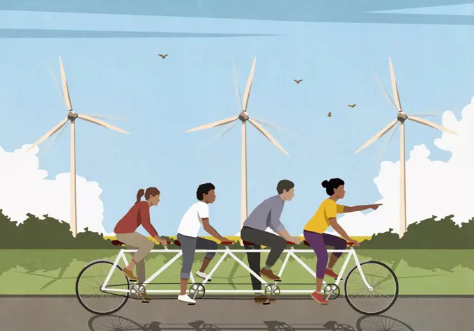 Friends riding tandem bicycle along idyllic field with wind turbines