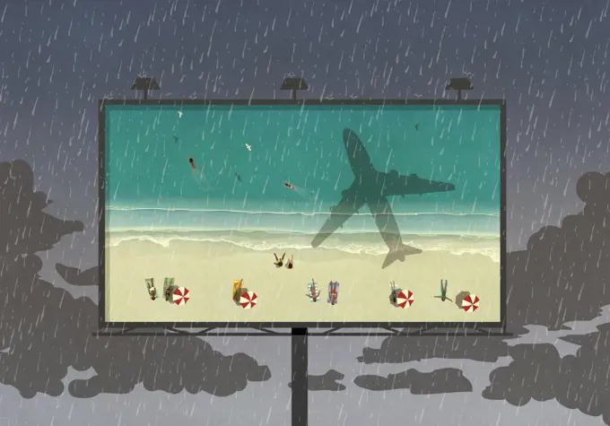 Tourists at beach on billboard against rainy sky