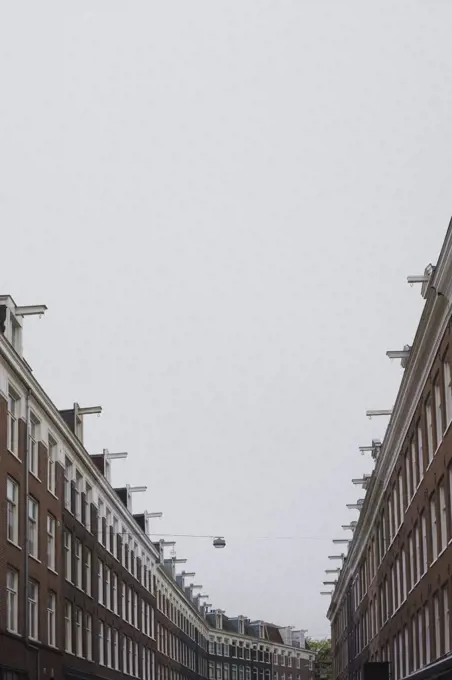 Row houses under overcast sky, Amsterdam, Netherlands, Holland
