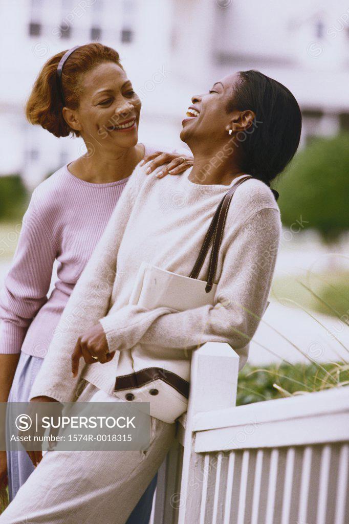 Stock Photo: 1574R-0018315 Mother talking to her daughter