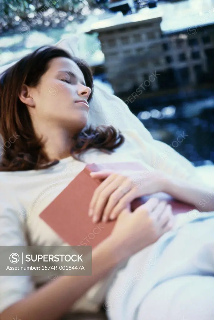 Close-up of a young woman asleep