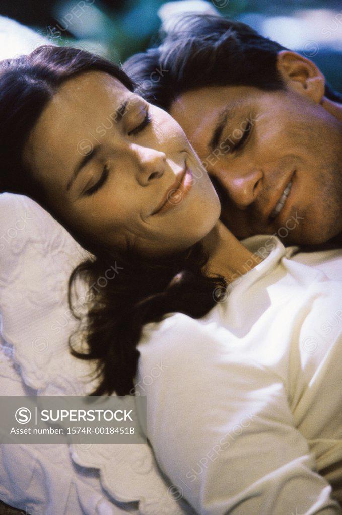 Stock Photo: 1574R-0018451B Close-up a young couple sleeping