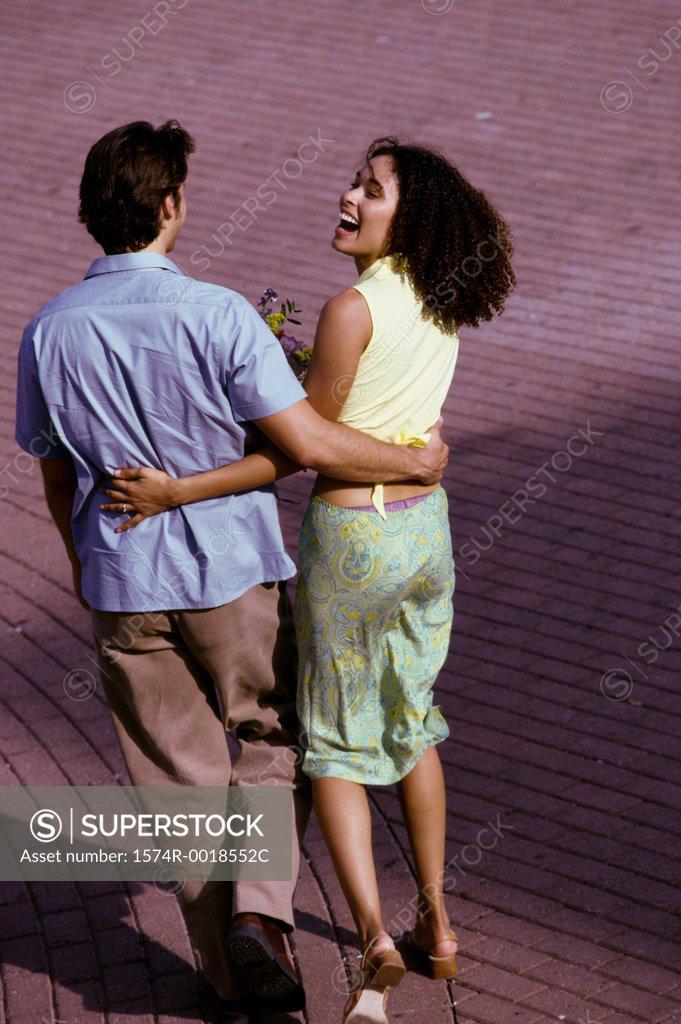Stock Photo: 1574R-0018552C High angle view of a young couple walking