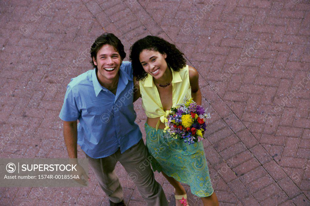 Stock Photo: 1574R-0018554A High angle view of a young couple smiling
