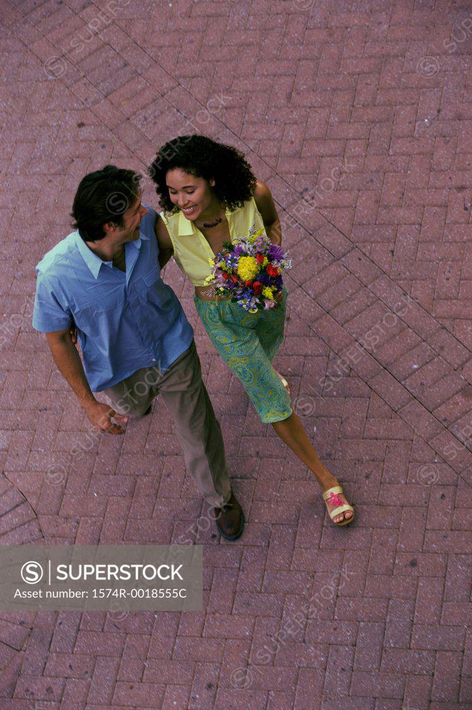 Stock Photo: 1574R-0018555C High angle view of a young couple walking